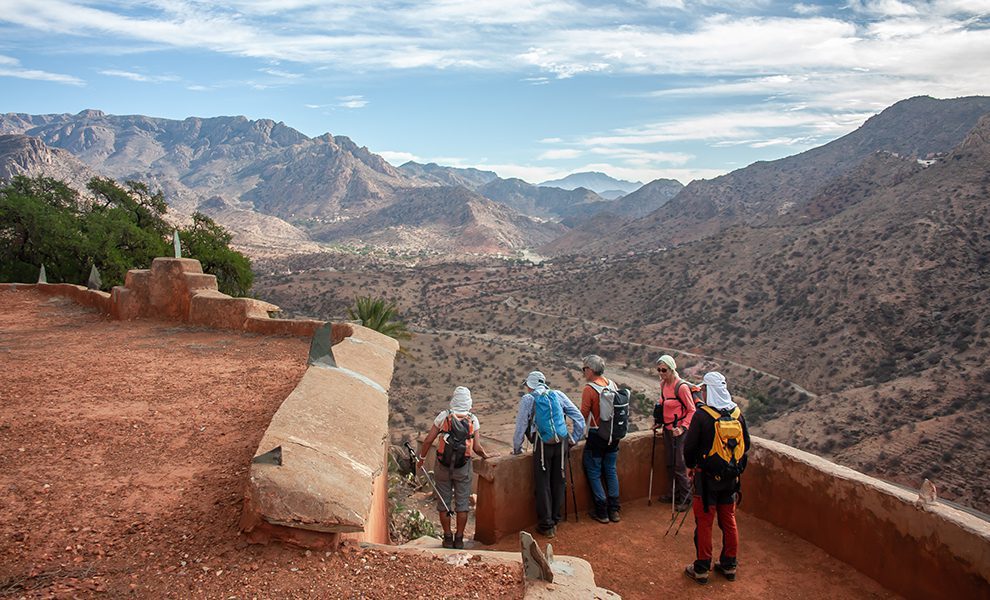 A group of hiker enjoying the view from the top of local house